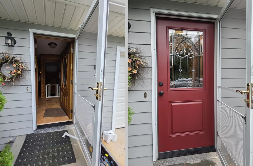 Red entry door with decorative glass and an open storm door